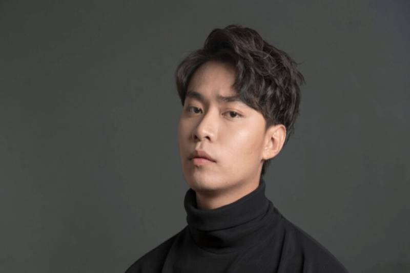 Tóc nam side part xoăn